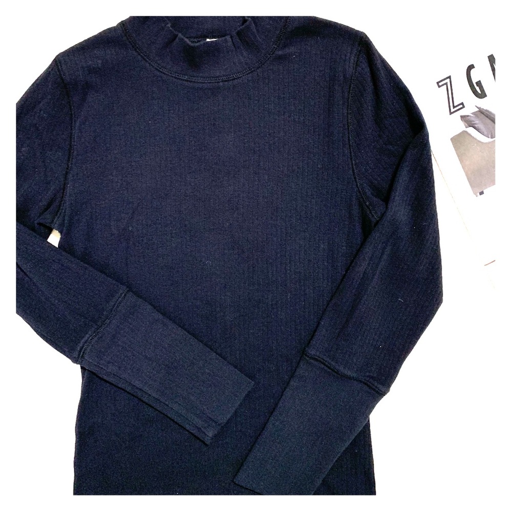 Free People black turtleneck with flaw